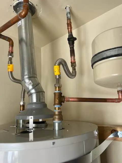 Water heater installation and plumbing repair in Newton Heights